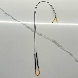 Black and gold necklace great condition 16 inches long